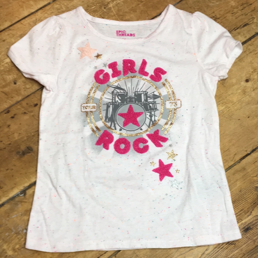 Girls scoop neck tee with flocked screen detail.